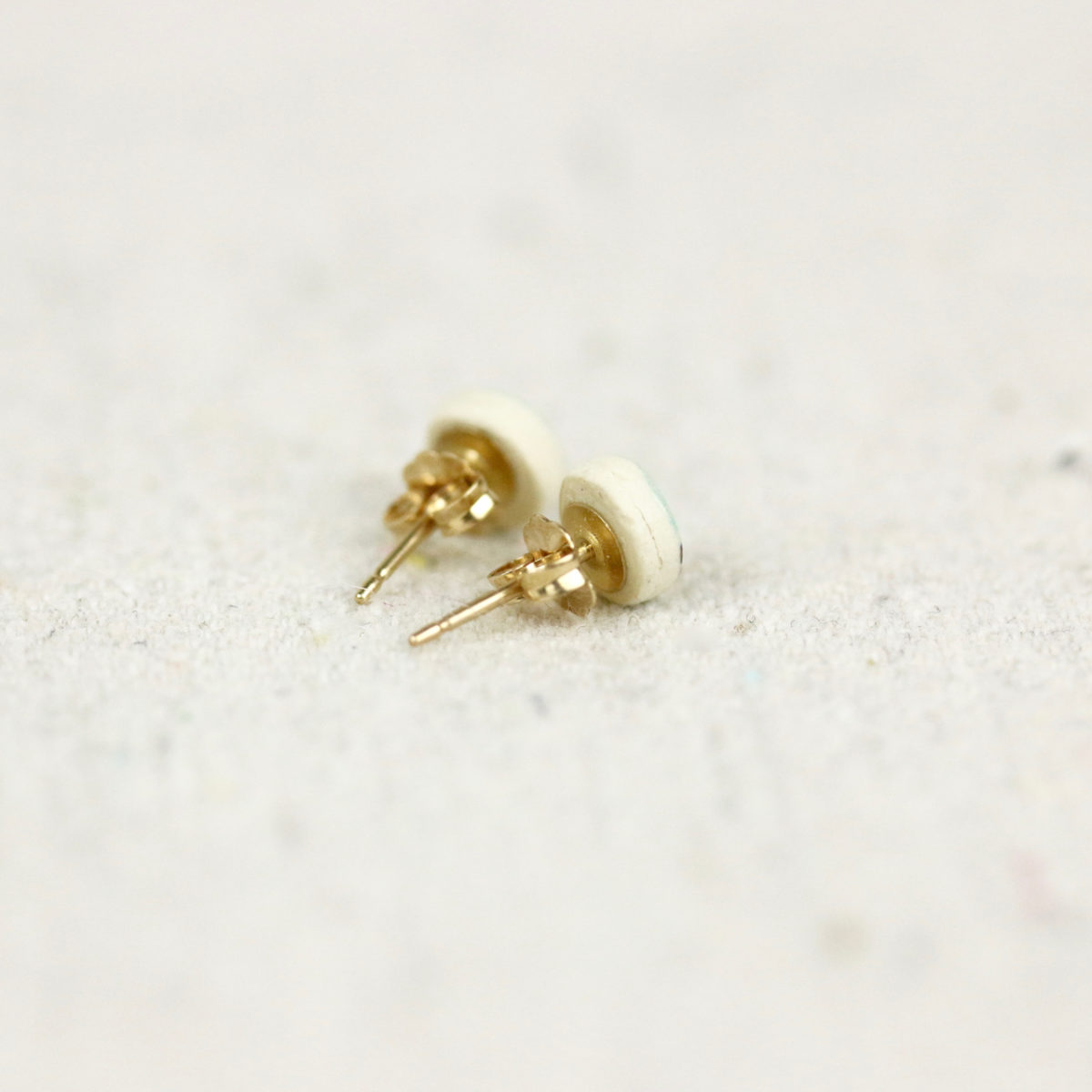 tiny pebble studs back view